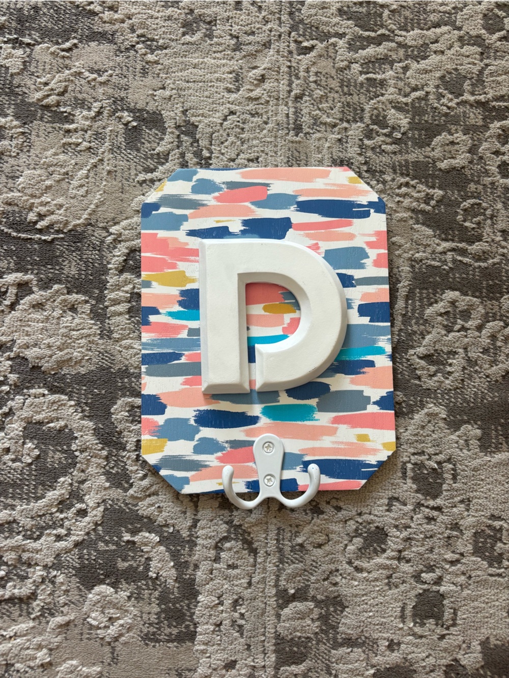Decorative hanger for keys or jackets or bags